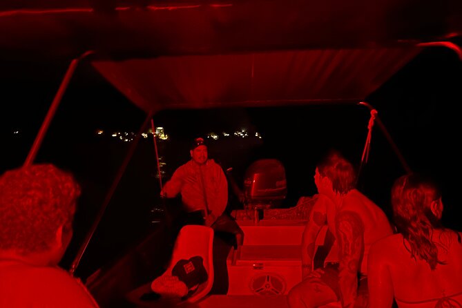 Bioluminescence & sunset local boat tour to Los Arcos Sanctuary - Getting into the water at Los Arcos