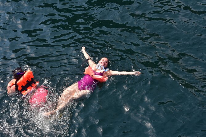 Catamaran Tour to the Arches, Playa las Animas, Snorkeling and more - The two-hour return turns into a floating party