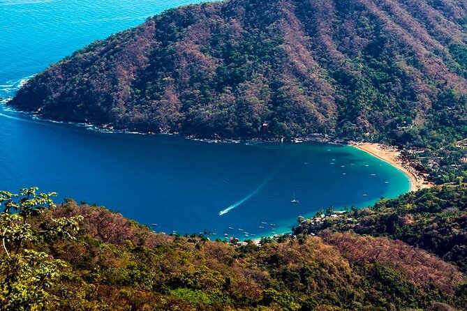 Catamaran Yelapa Beach Tour with Snorkeling, Food and Open Bar - Leaving Puerto Magico and Crossing Banderas Bay