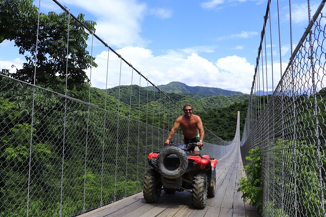 Combo ATV Jorullo Bridge + zip lines + mule ride - Crossing Jorullo Bridge above the Cuale River