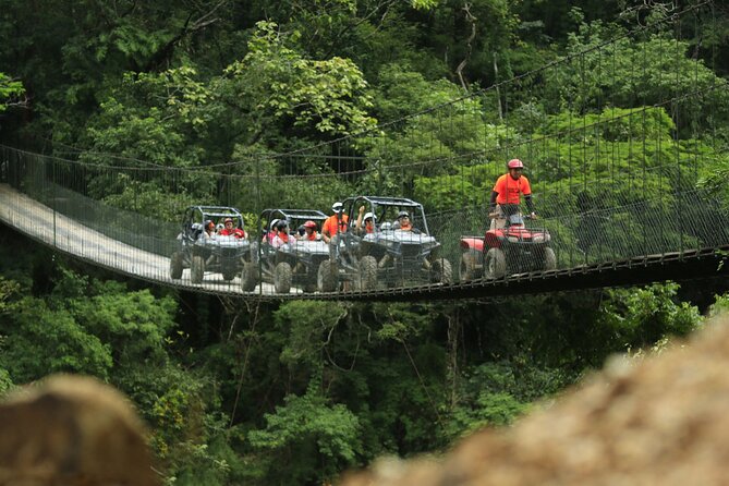 Half Day ATV and RZR Tour to El Jorullo Hanging Bridge - Riding through Canopy River Park