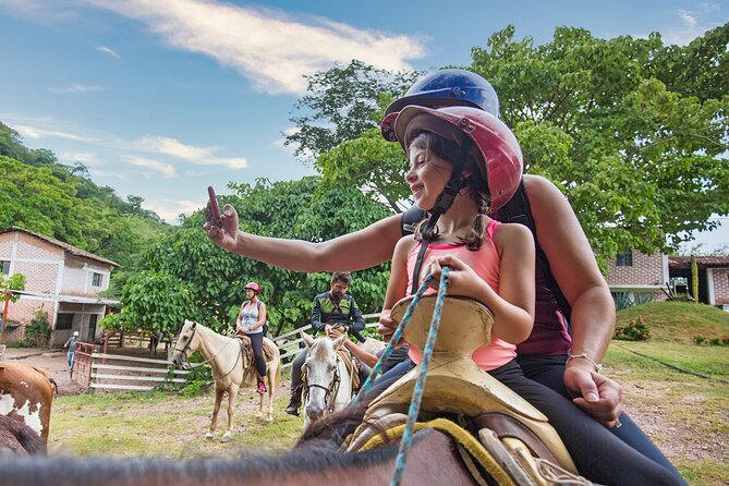 Horseback Riding Tour in Sierra Madre from Puerto Vallarta - Crossing streams and riding beside the river
