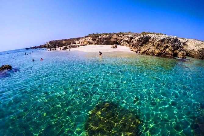 Marietas Islands Snorkeling Tour - Passing through the Stone Bridge crater