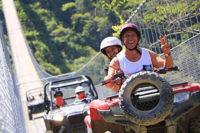 Puerto Vallarta: ATV Jorullo Bridge Adventure - Crossing Jorullo Bridge high above the river