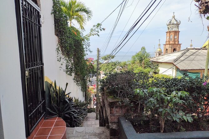 Puerto Vallarta Historical El Centro: A Self-Guided Audio Tour - Faro del Malecon and the return to the waterfront