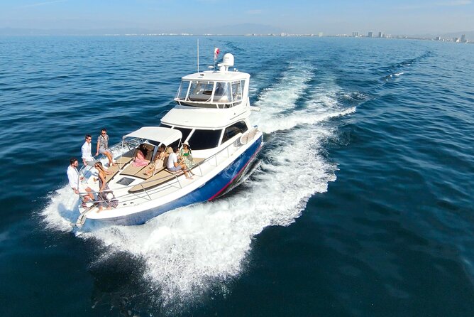 Puerto Vallarta: Private Luxury Yacht Sunset Cruise with Open Bar - Los Arcos: Rocks, Birds, and a Wide Pacific View