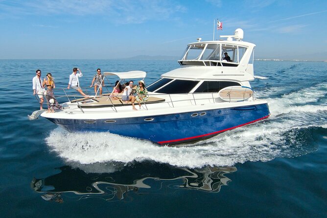 Puerto Vallarta: Private Swim & Snorkel Yacht Tour w/Open Bar - Cruising past the Malecon on the way back