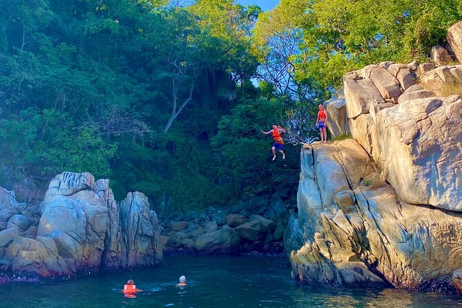 Snorkeling at Los Arcos 5 islands Hidden Beach and Cliff Jumping - A small beach reached only by boat