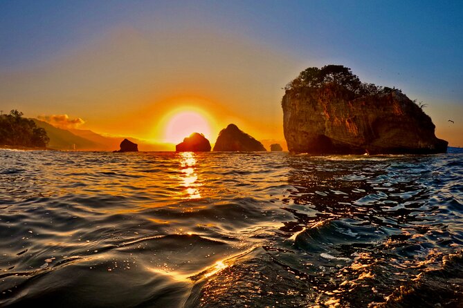 Sunset and Bioluminescence Boat Tour at Los Arcos Islands - What is included for $79