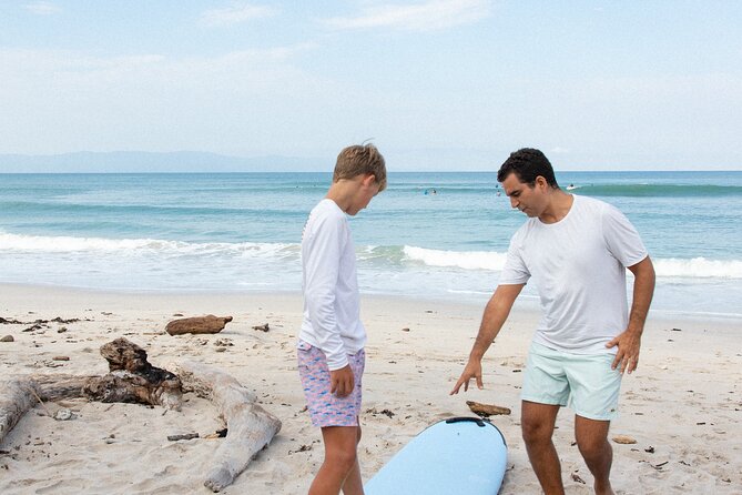Surf Lesson - Learning the board and safety basics on the sand