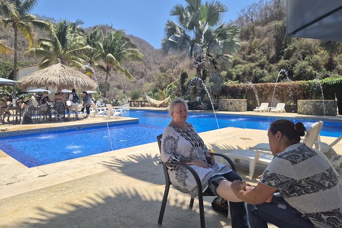 Volcanic Hot Springs, Foot Massage, Tequila & Mex BBQ - Soaking in water from the volcano