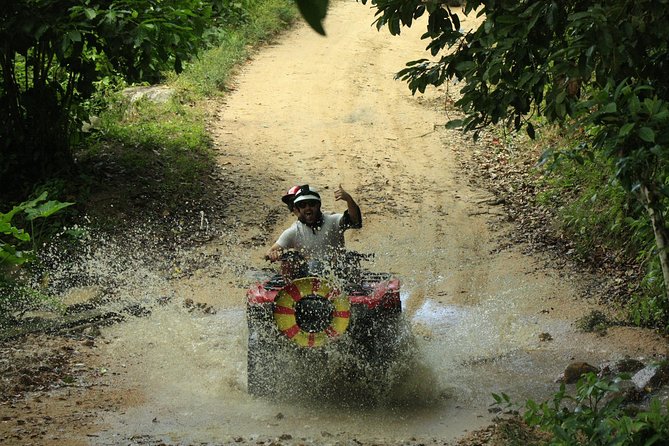 Zipline & ATV Jungle Adventure Combo - Mountain ATV climbs, descents, dust, and water
